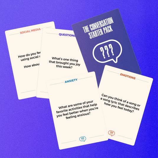 Five conversation starter pack cards splayed out on a blue background.